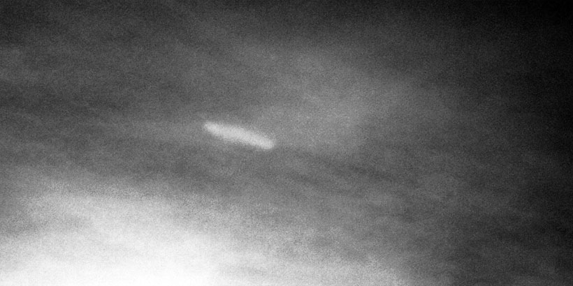 Cigar-shaped UFO (grayscale / magnification)