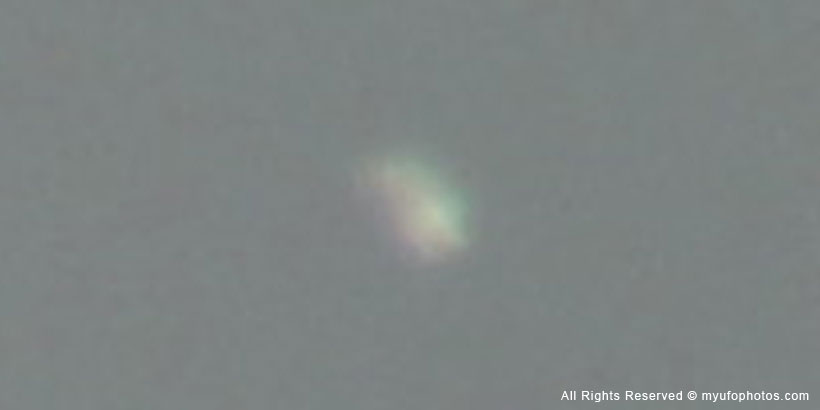 UFO with green glow