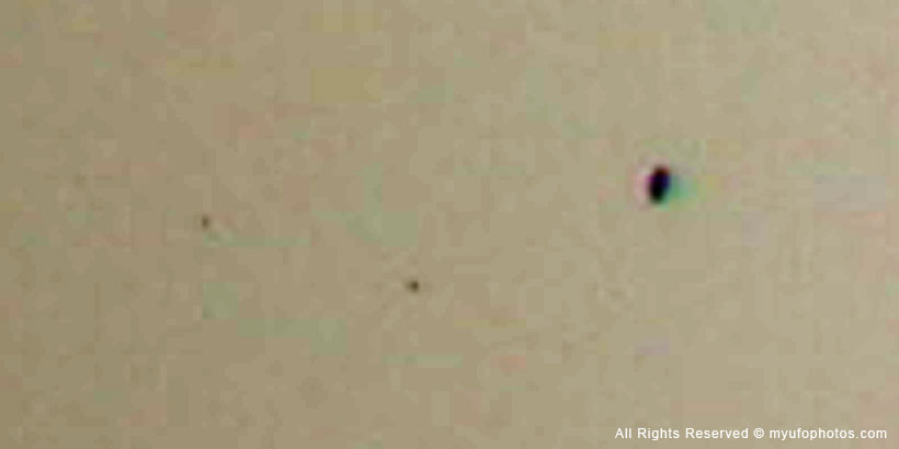 UFO with two probes (negative/brightness)