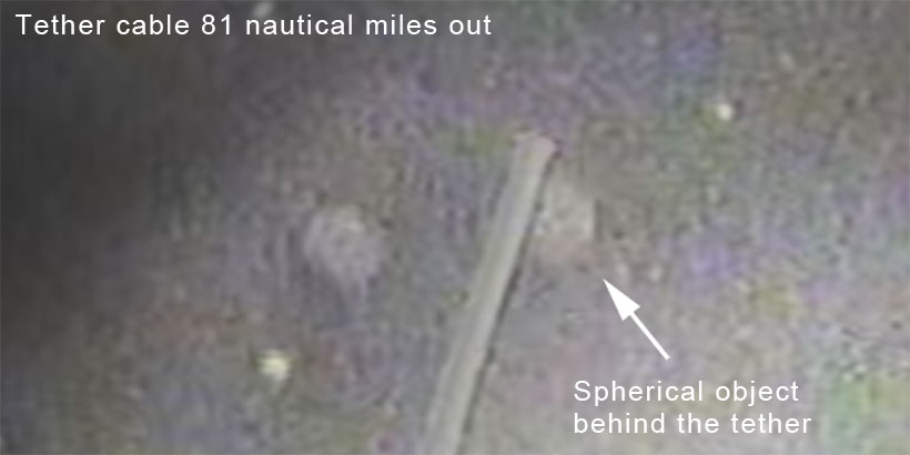 Spherical object behind the tether