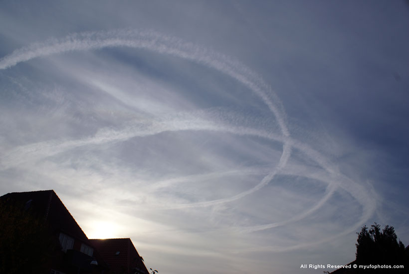 Strange contrails above Denmark caused by F16 jet fighters?