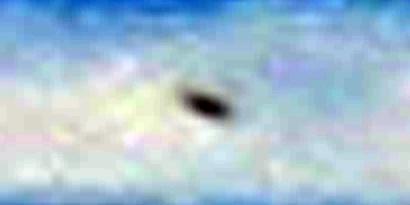 Disc-shaped UFO in aviation contrail photos