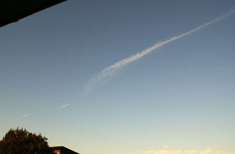 Incredibly photogenic contrail dissolves in the sky