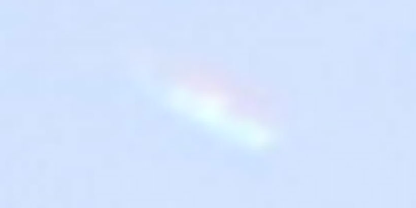 Oblong cloudy UFO (unedited / magnified)