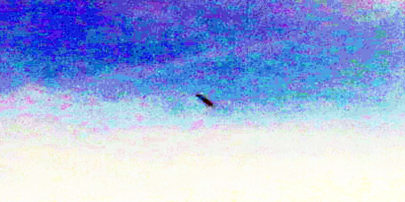 Elliptical dome UFO with an extended elongated structure