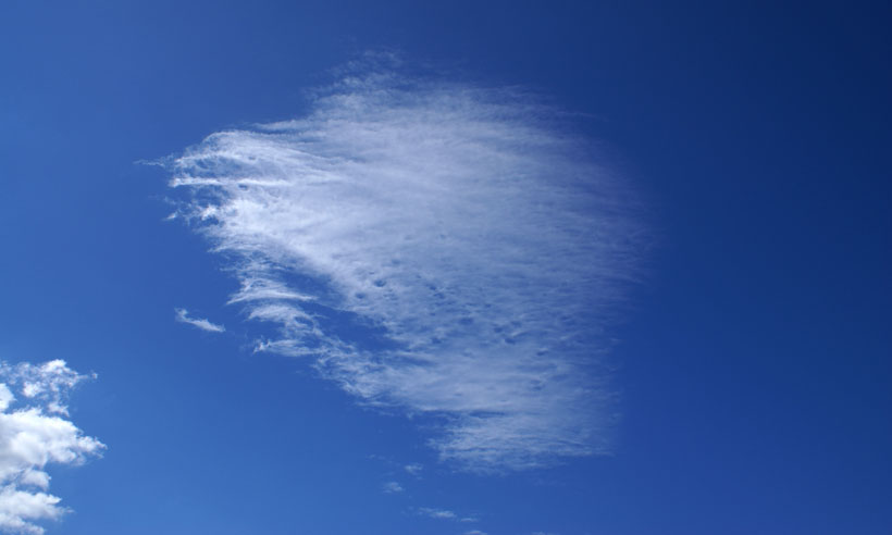Beautiful Cirrocumulus cloud section above Cumulus